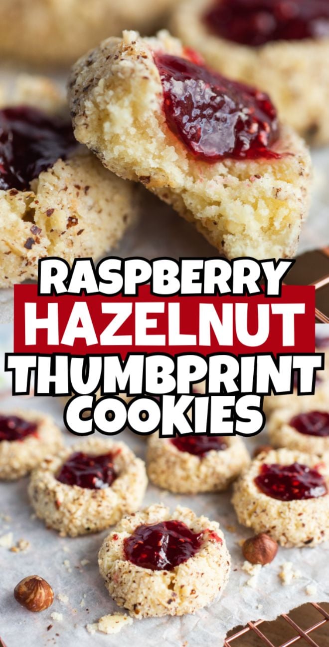 Raspberry hazelnut thumbprint cookies with jam centers, one bitten, are beautifully displayed on parchment paper—these hazelnut thumbprint cookies with jam make for an irresistible treat.