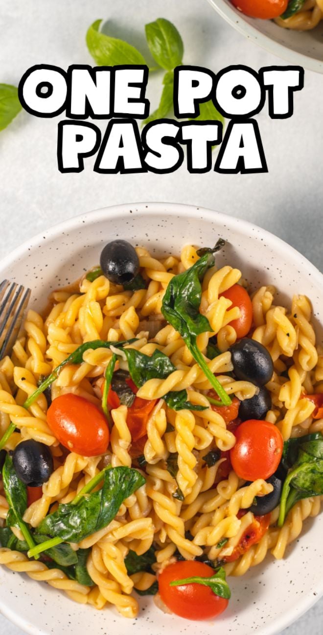 A bowl of pasta with baby spinach and cherry tomatoes, plus olives, labeled "One Pot Pasta" at the top.
