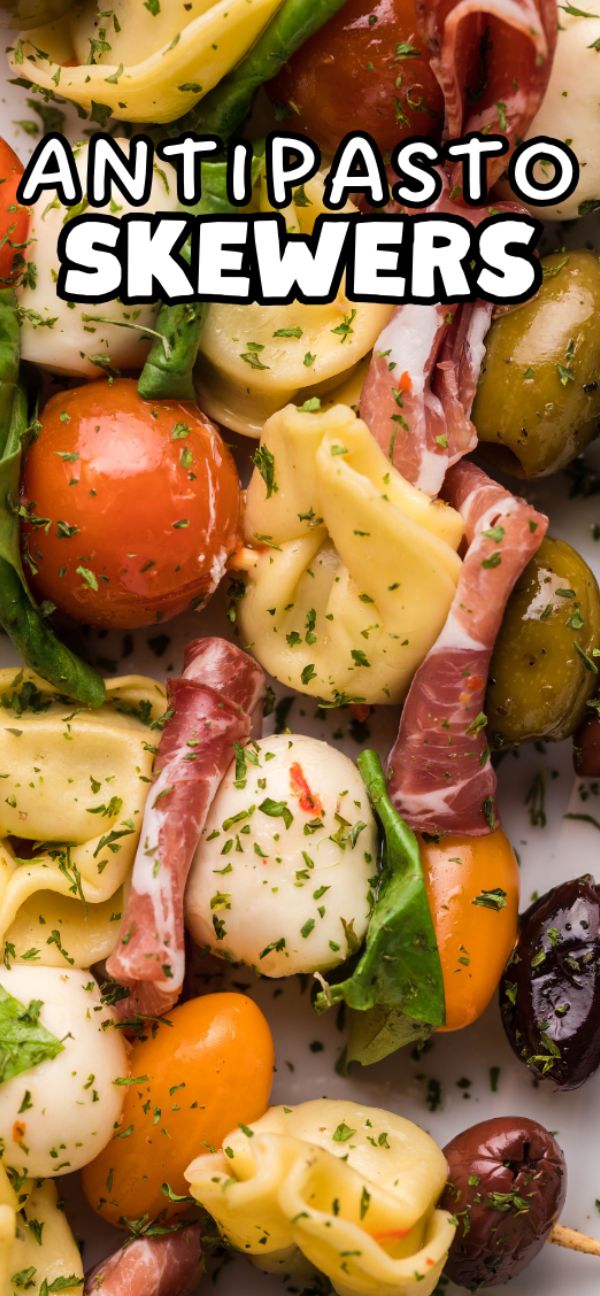Colorful antipasto bites with tortellini, tomatoes, mozzarella, olives, and herbs&mdash;these Antipasto skewers are a flavorful twist on classic Italian appetizer recipes, topped with text.