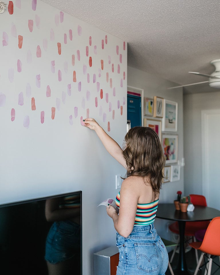 Blogger Bella Bucchiotti of xoxoBella.com shares about decorating her apartment with wall decals. She got the Urban Walls wall decals from Wayfair.