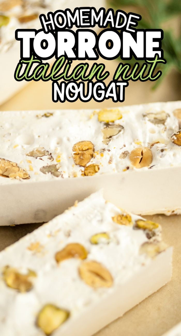 Close-up of homemade Italian nut nougat (torrone) bars with visible pistachios and hazelnuts, a delightful treat often enjoyed alongside Italian Christmas cookies like Cucidati fig cookie.