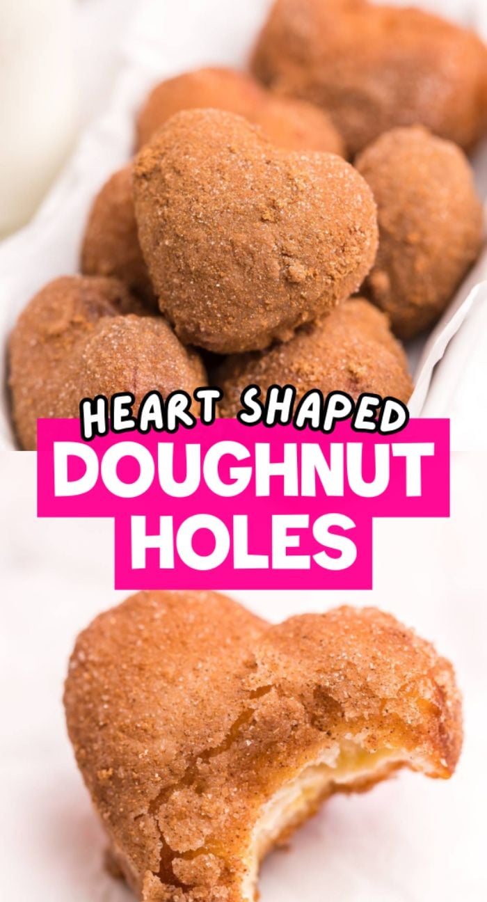 Heart-shaped doughnut holes, made using a simple mini doughnut recipe, are arranged on a white background—some whole and one with a bite taken out.