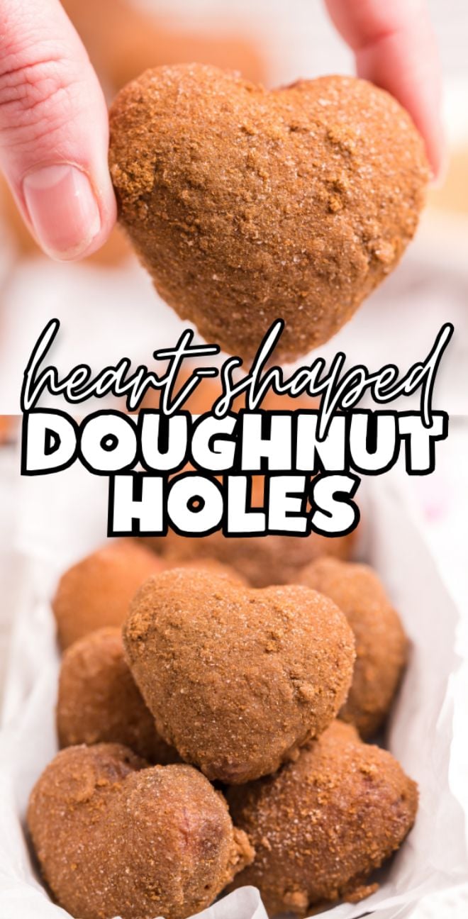 A hand holds a heart-shaped doughnut hole above a tray filled with more heart shaped doughnut holes, perfect for trying out your favorite mini doughnut recipe.