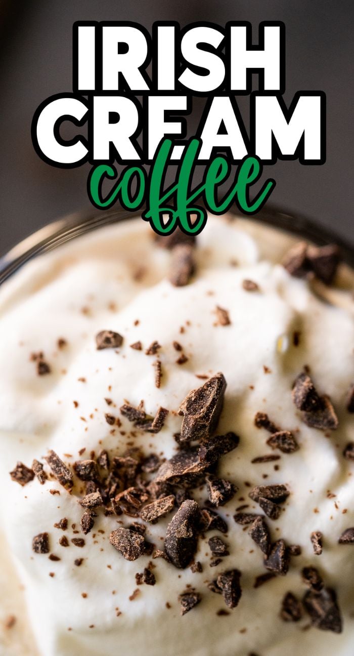 Close-up of whipped cream topped with chocolate shavings on this alcoholic coffee drink, with text "Irish Cream Coffee" above.