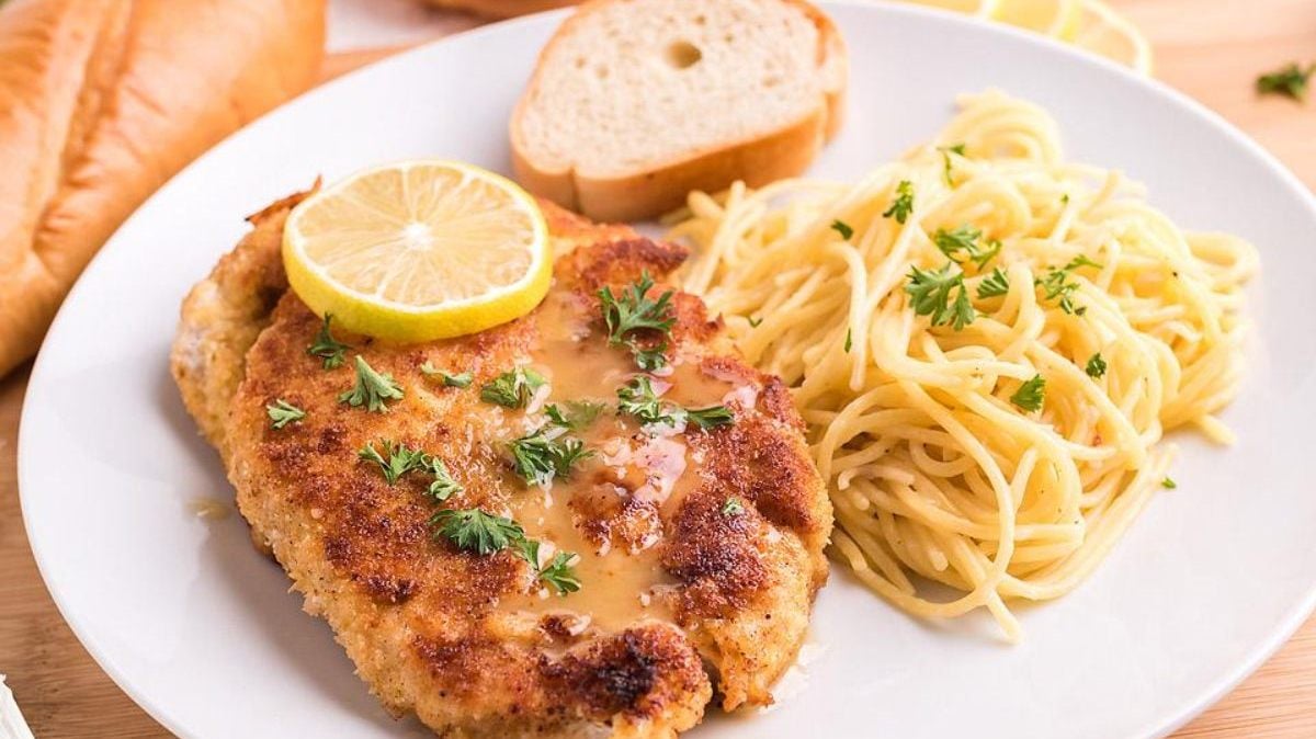 Chicken piccata over gluten-free angel hair pasta.