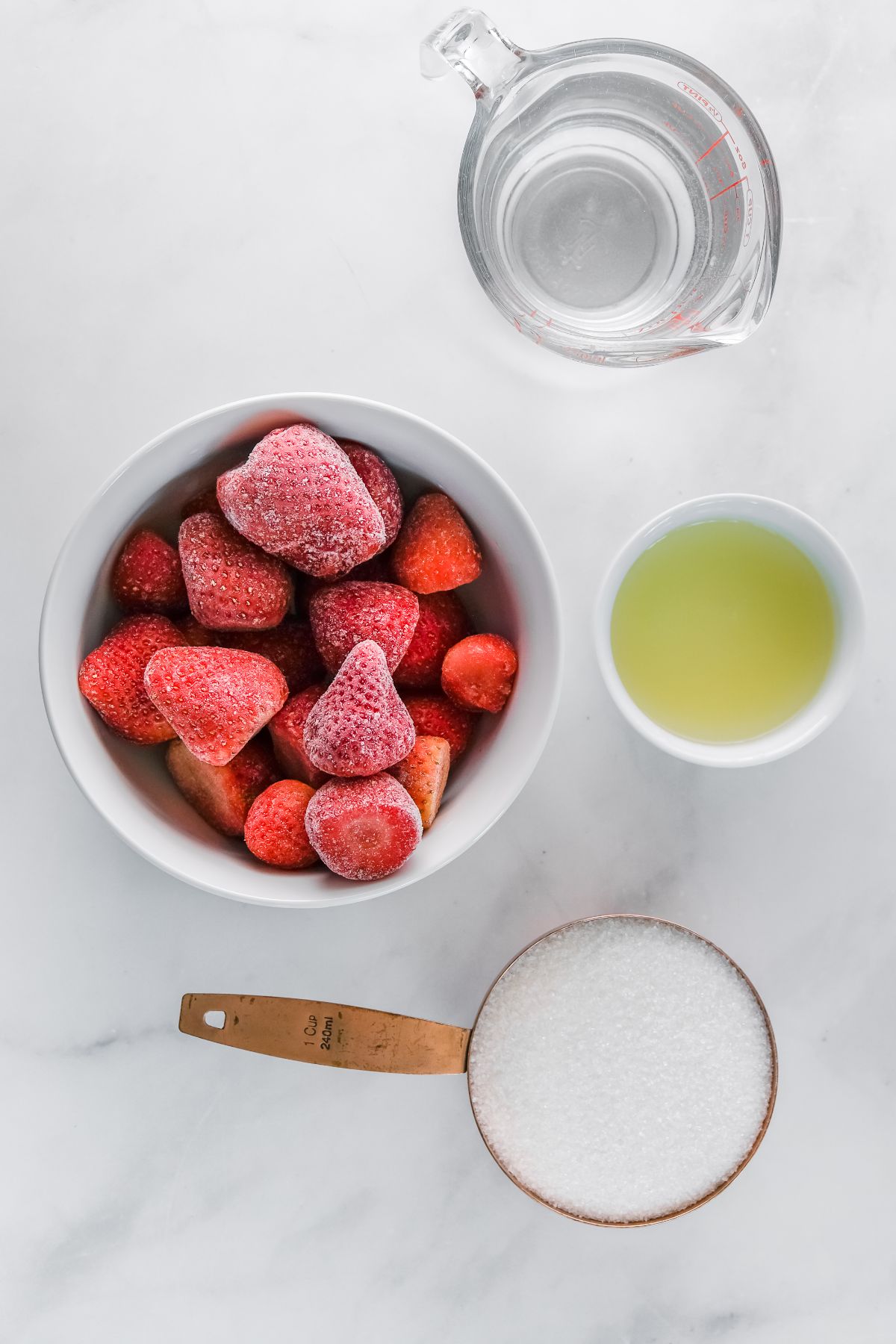 Quick and easy sorbet made with frozen strawberries, a cup of sugar, lemon juice, and water—sorbet with just 4 ingredients for a delightful treat.