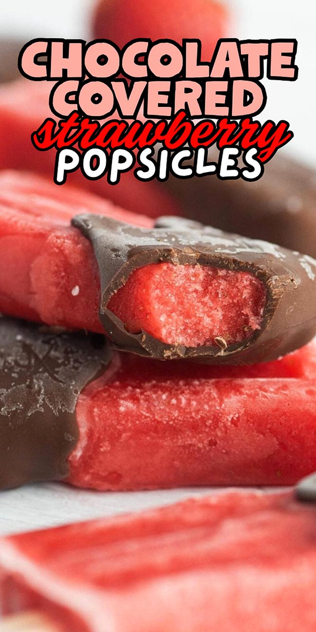 Chocolate-covered strawberry popsicles, with one popsicle bitten to show the red interior.