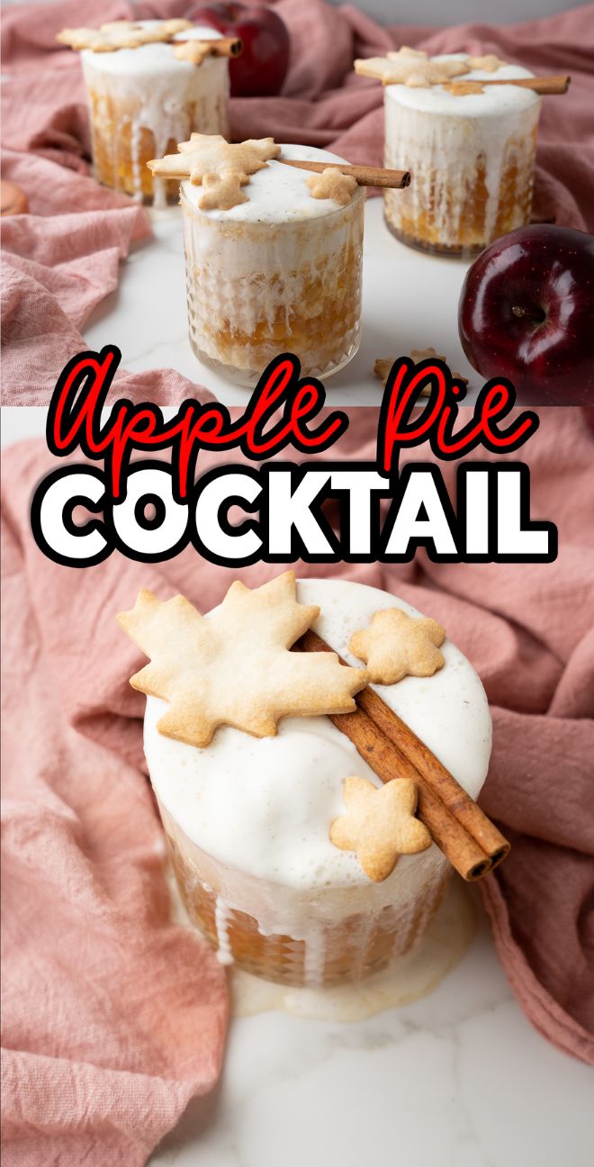 Glass of Apple Pie Cocktail with creamy froth, cinnamon stick, and leaf-shaped cookie garnish on a pink cloth—an inviting autumn cocktail recipe perfect for cozy evenings.