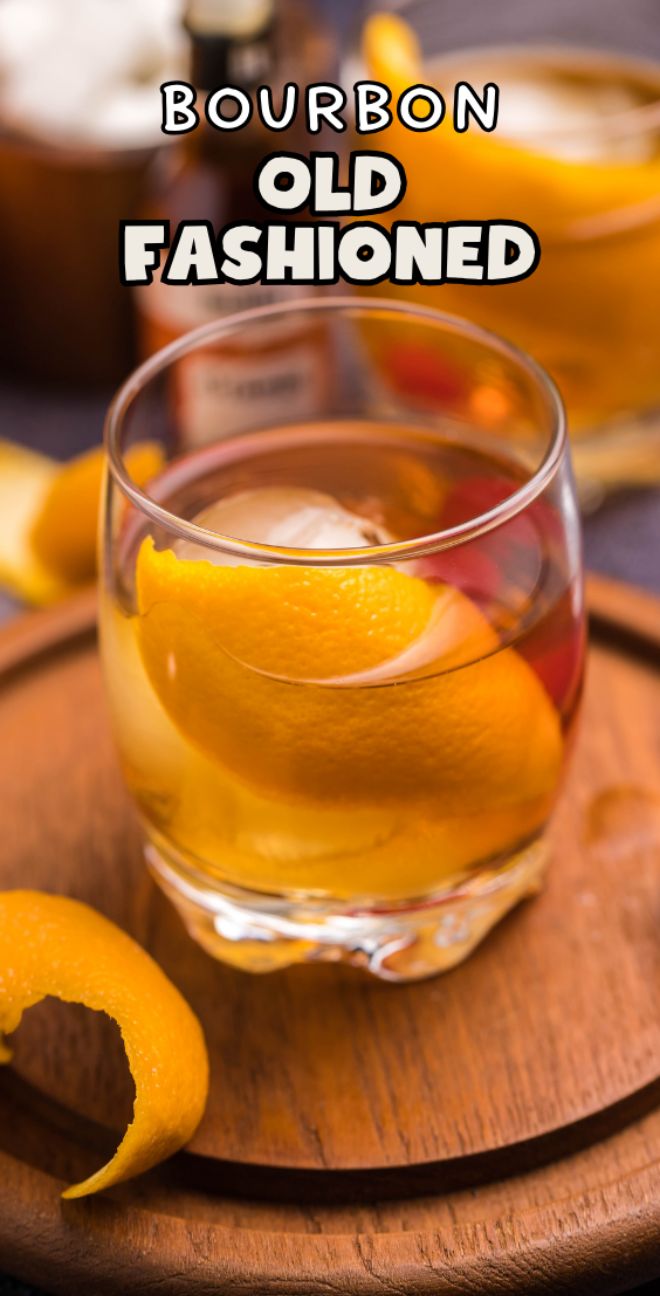 A bourbon old fashioned cocktail with orange peel garnish, served on a wooden tray—a classic drink you can make with bourbon and perfect for anyone seeking the best old fashioned recipe.