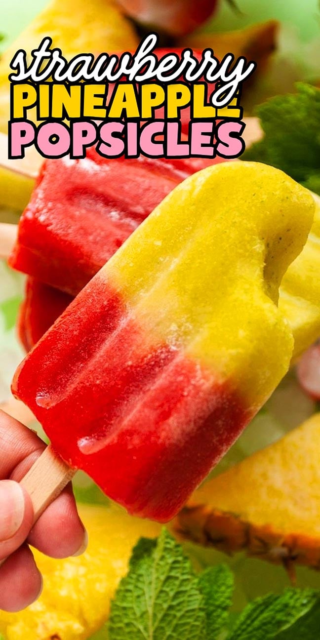 Hand holding a red and yellow layered popsicle with the text “strawberry PINEAPPLE POPSICLES” above.