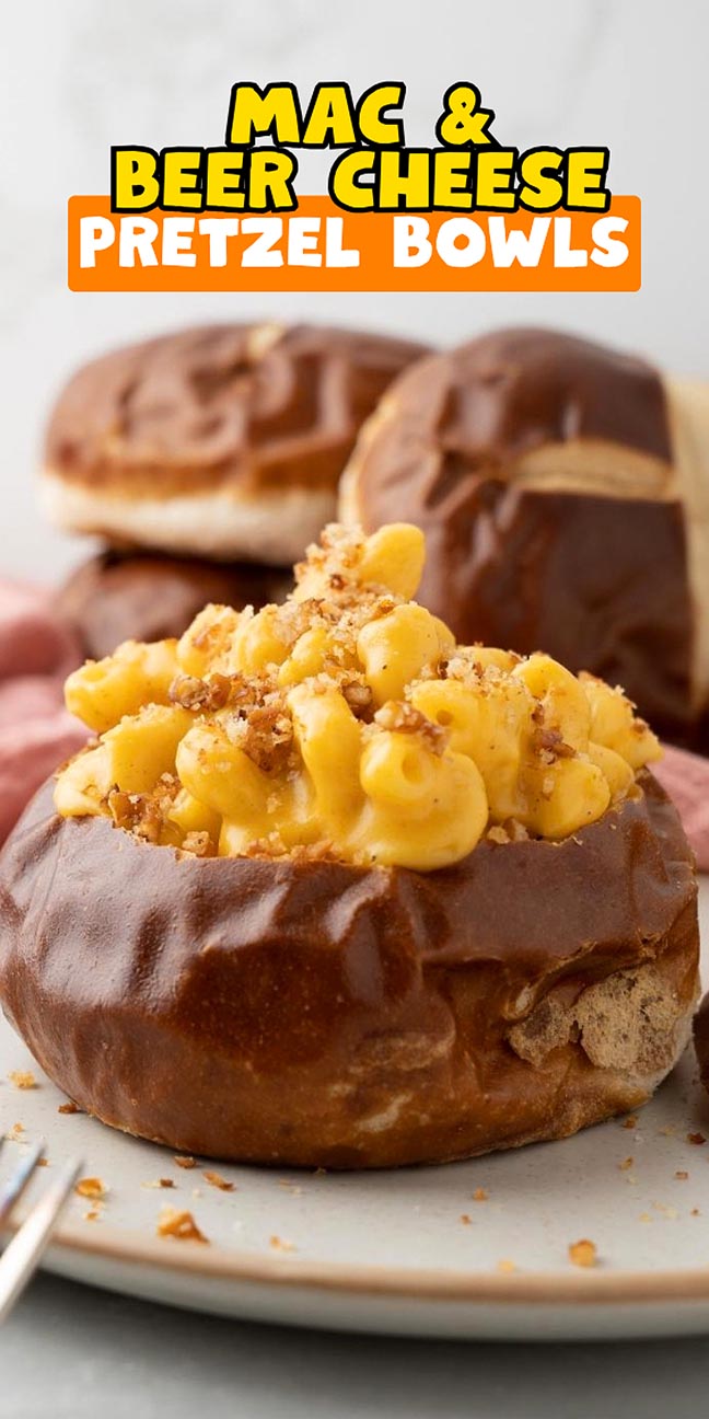 Mac and beer cheese pretzel bowls filled with macaroni and cheese topped with breadcrumbs.