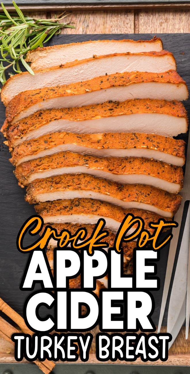 Sliced turkey breast garnished with herbs on a dark board, labeled "Slow Cooker Apple Cider Turkey Breast"—a flavorful slow cooker turkey breast recipe perfect for easy, tender results.