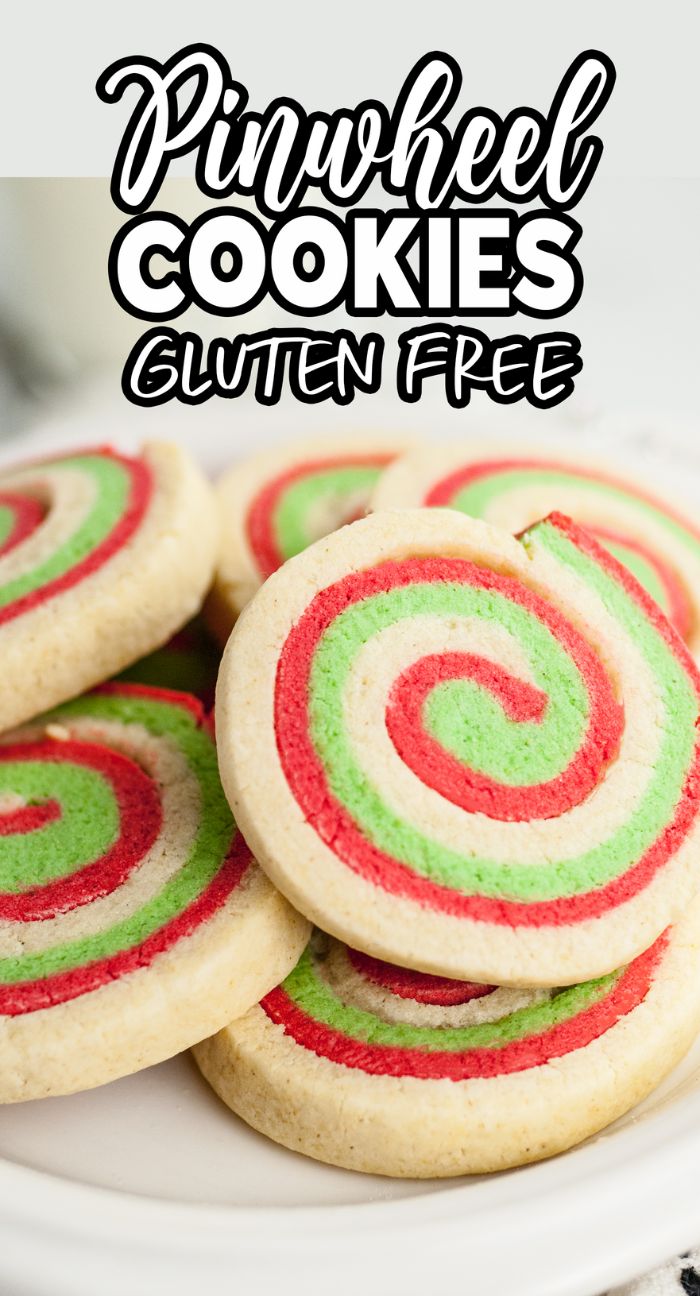 Gluten Free Pinwheel Cookies with festive red and green swirls make the perfect red and green Christmas cookies, beautifully displayed on a white plate.