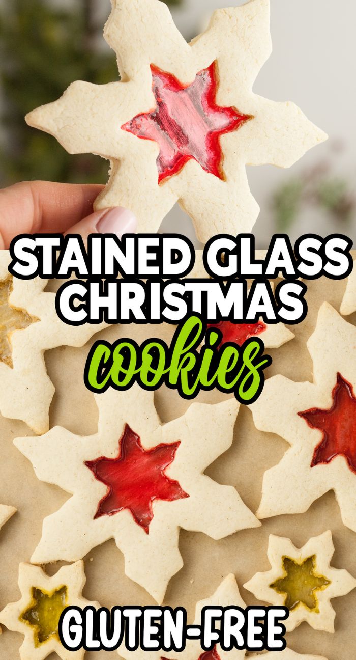 Hand holding Gluten Free Stained Glass Christmas Cookies, with vibrant centers made from hard candy melt. "Gluten-free" text overlay highlights these colourful gluten free sugar cookies, perfect for the holidays.