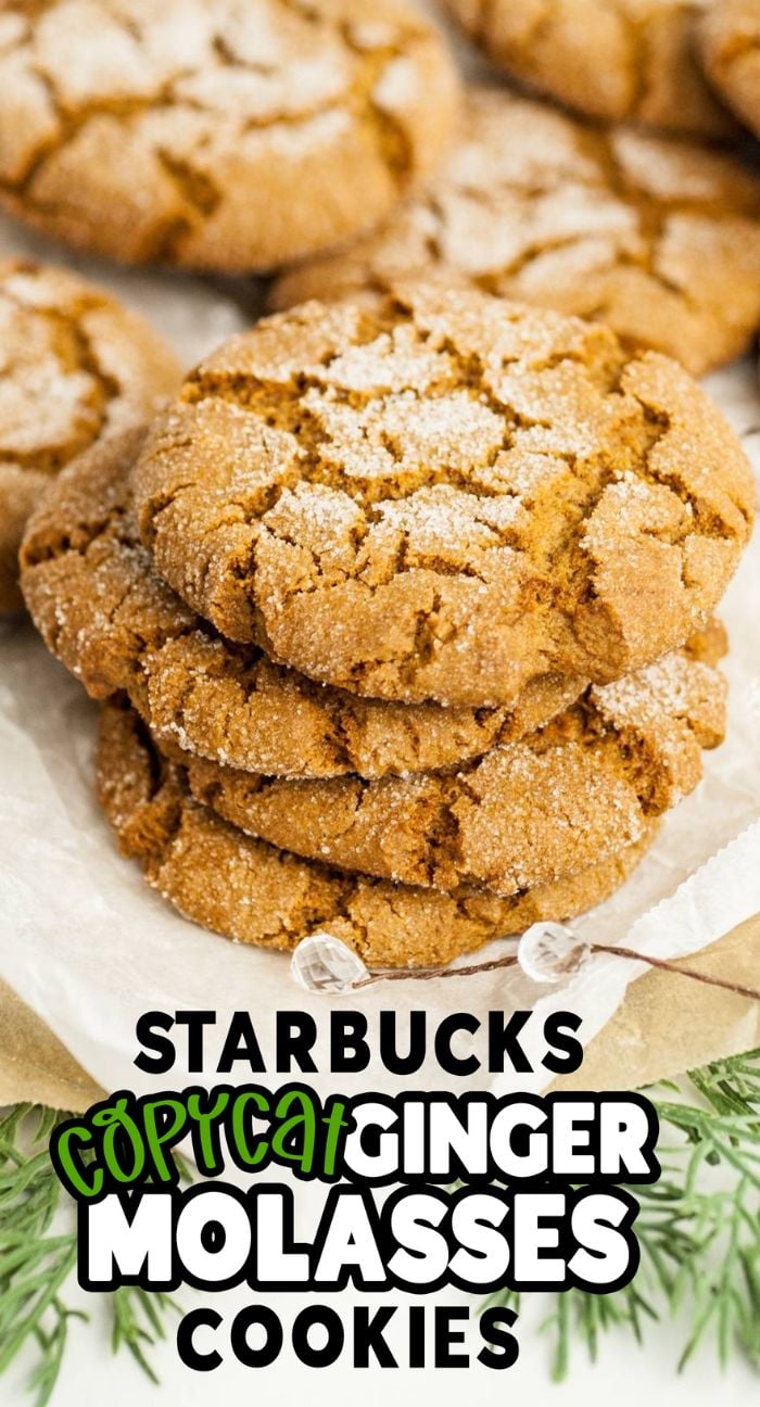 Three homemade Starbucks Copycat Ginger Molasses Cookies stacked on parchment, surrounded by more cookies, with a text overlay about the recipe. Perfect for recreating those classic Starbucks gingerbread cookies at home.