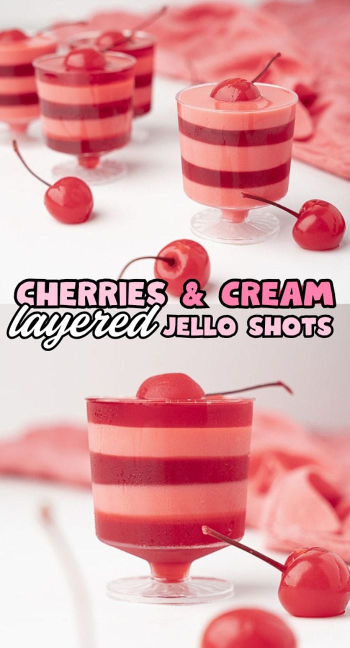 Layered rum jello shots in small cups, topped with cherries, make these Cherries and Cream Jello Shots perfect for Valentine's Day celebrations.
