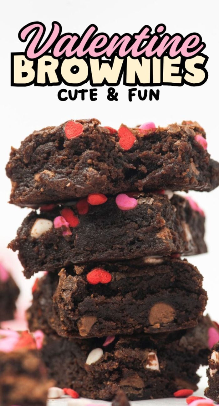 A stack of chocolate brownies topped with heart shaped sprinkles in red, pink, and white, labeled "Valentine Brownies"—the perfect sweet Valentine treat.