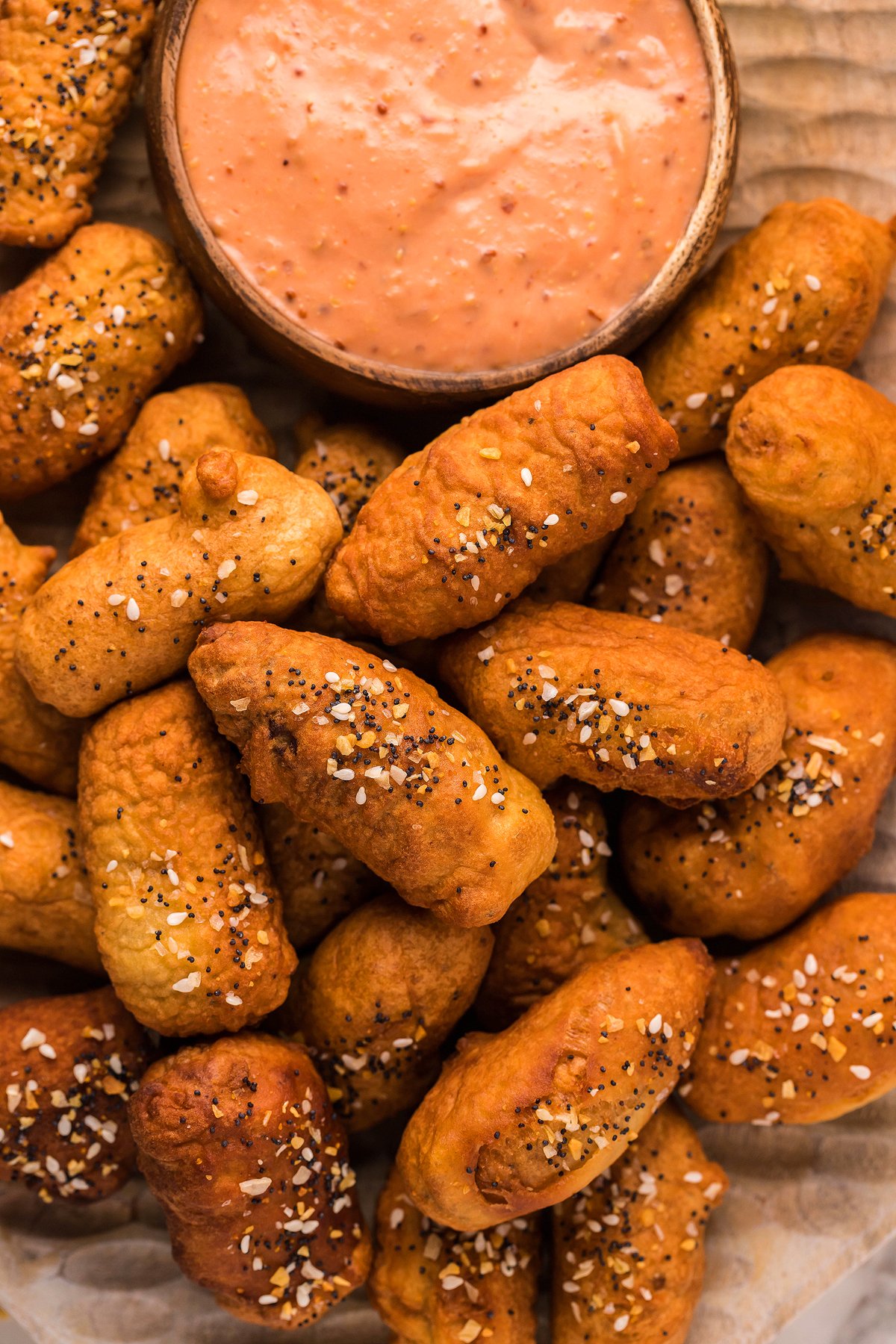 Bite-sized pretzel pieces topped with seasoning, served with an easy horseradish mayo dipping sauce—perfect as a game day appy or crowd-pleasing finger food.