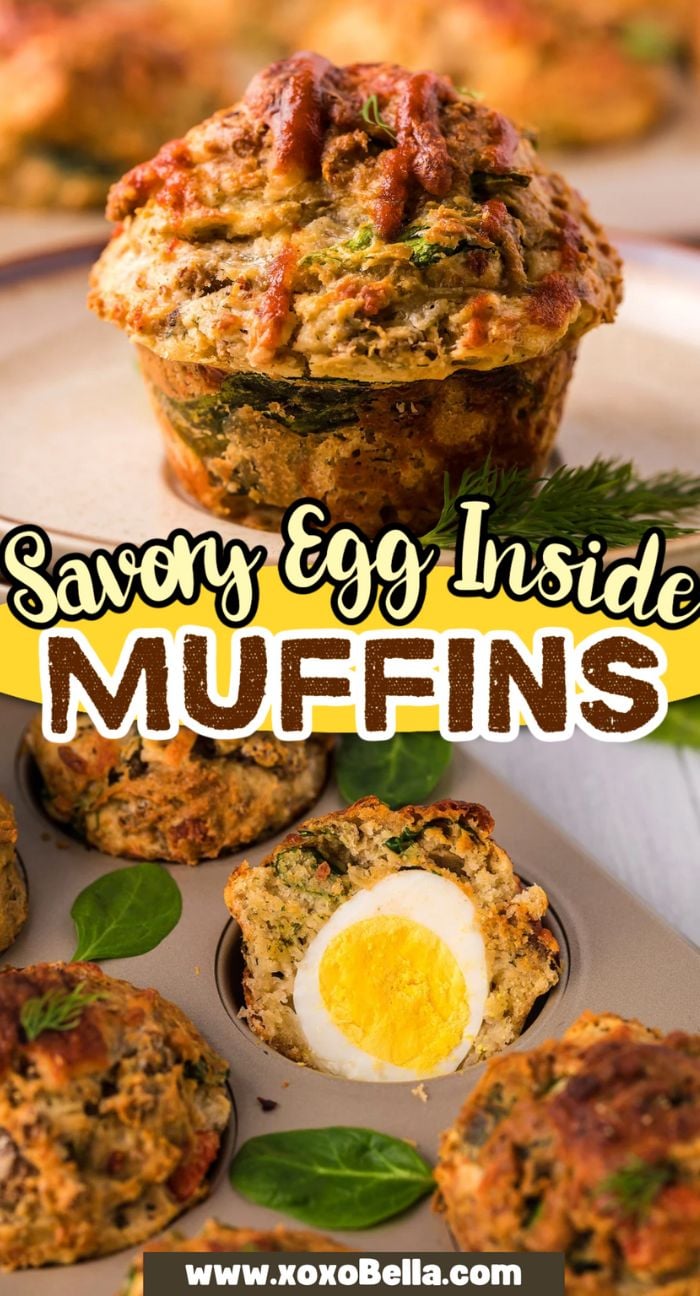 A savory sausage and cheese muffin cut open to reveal a soft boiled egg with a soft yolk inside, surrounded by more muffins on a tray.