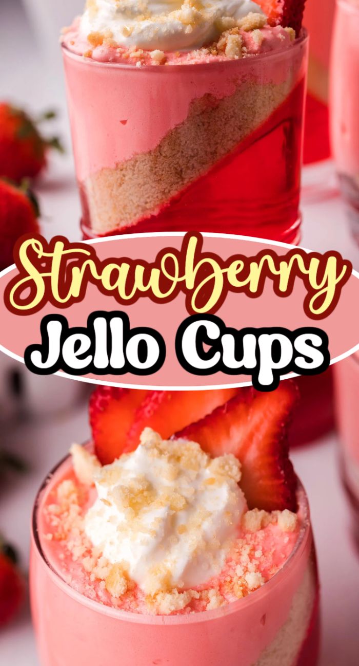 A close-up of Layered Strawberry Jello Cups, topped with whipped cream, crumbs, and fresh strawberry slices—these vibrant jello parfaits are the perfect sweet treat.