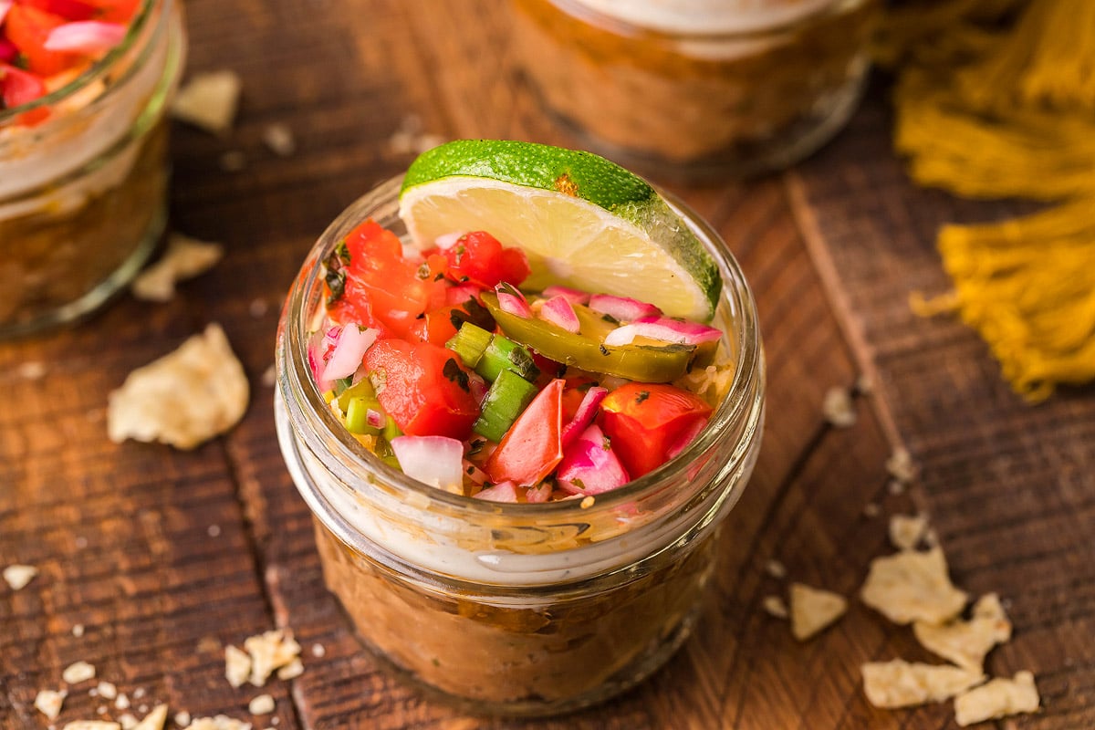 5 Layer bean dip in a glass dish.