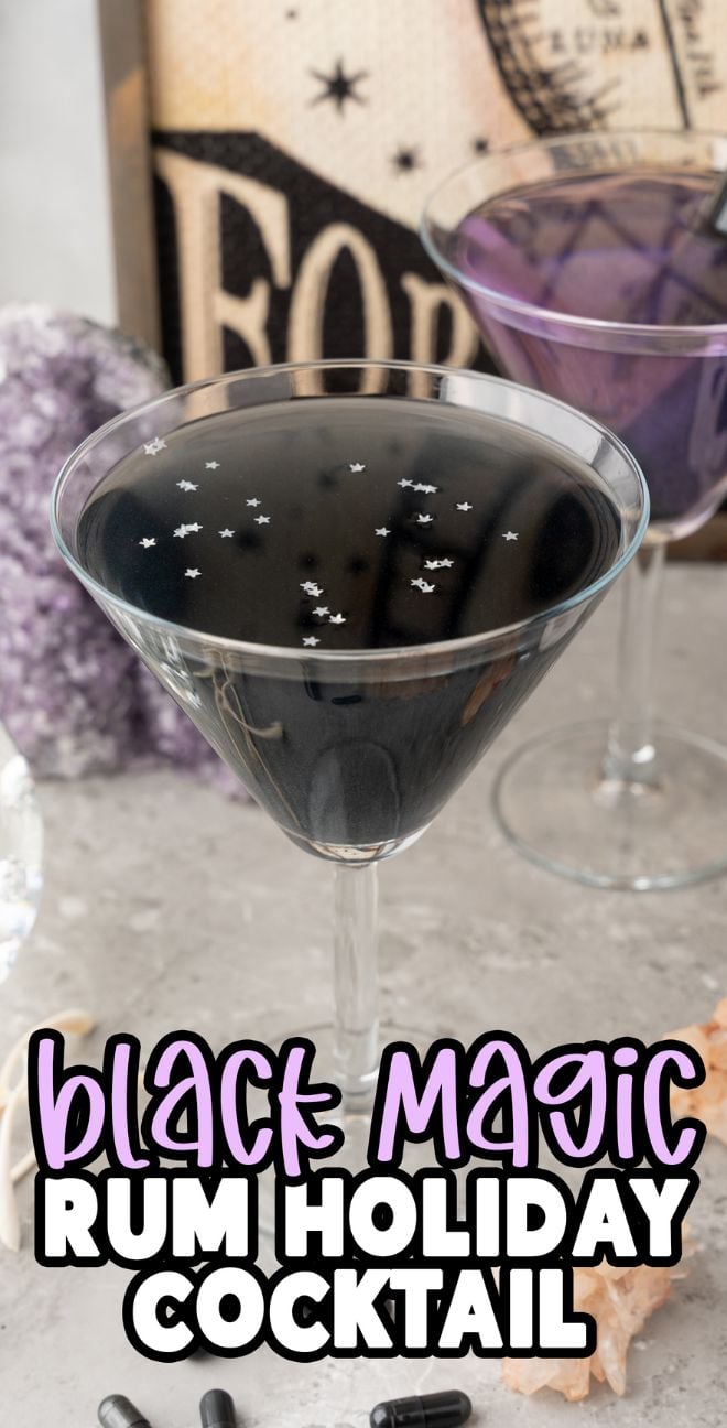 A black cocktail in a martini glass with star-shaped sprinkles, labeled “Black Magic Rum Halloween Cocktail,” featuring a themed mixed drink of sour grape schnapps and strawberry rum.
