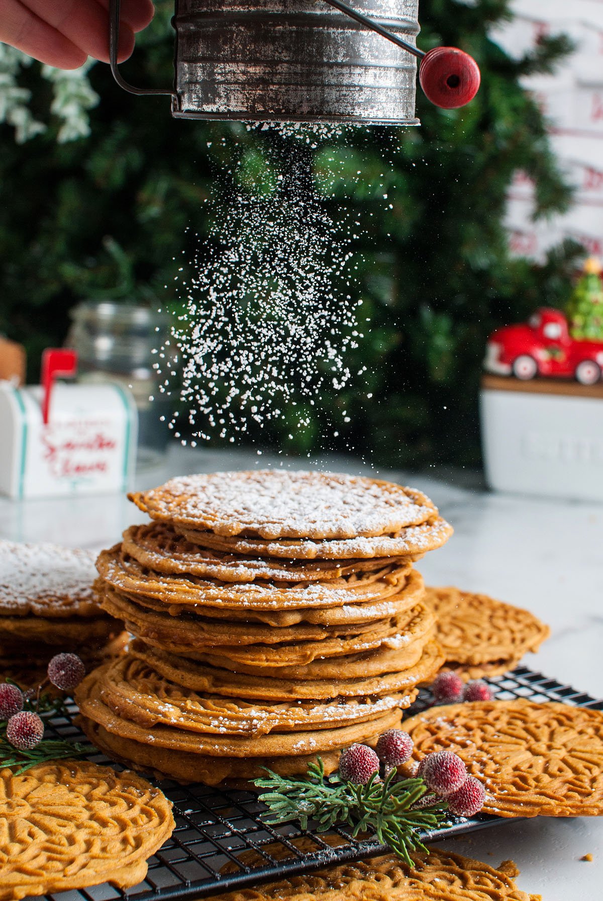 Food blogger, Bella Bucchiotti of xoxoBella, shares a gingerbread pizzelle recipe. Christmas pizzelles are a classic Italian cookie made in an iron or press.