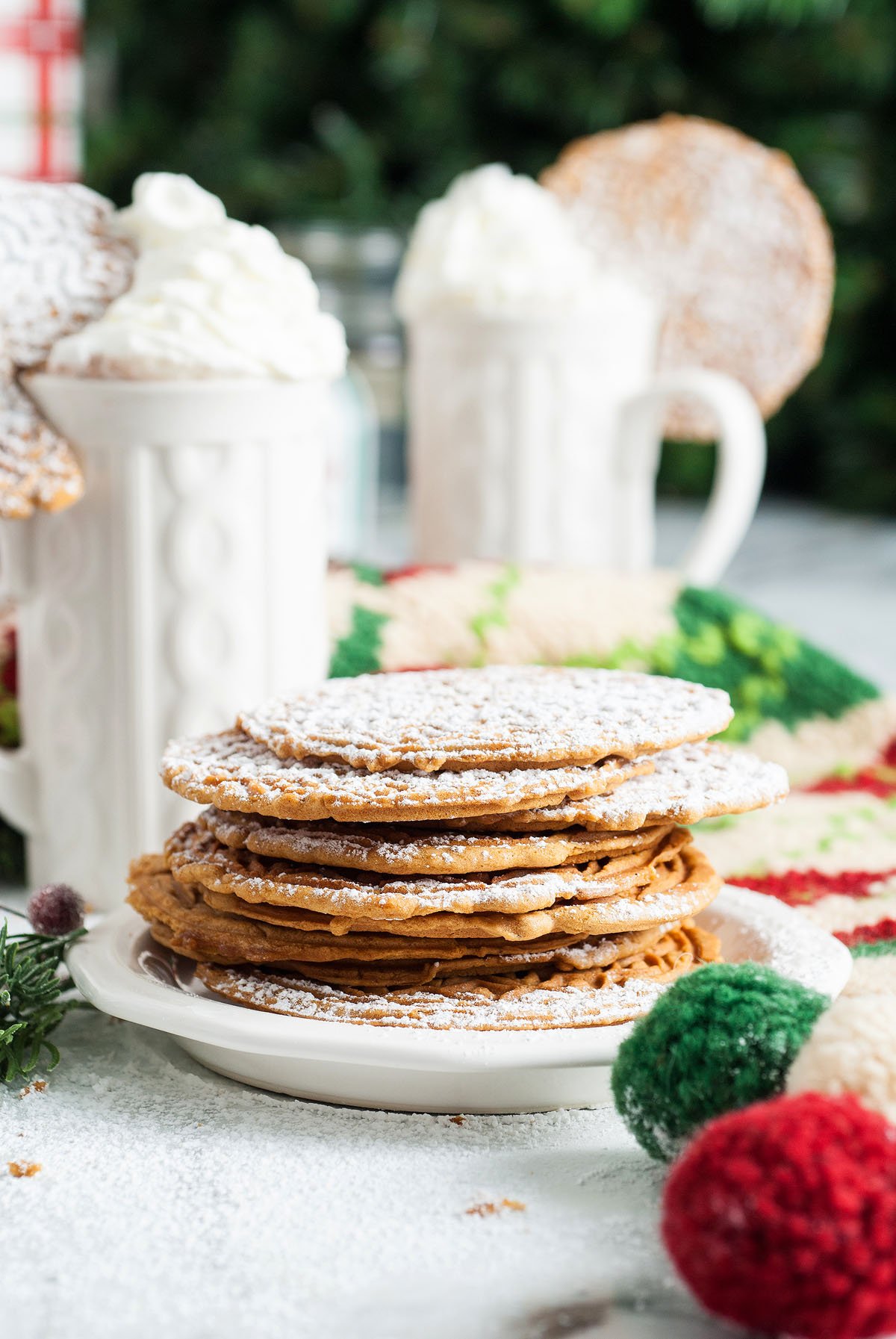 Food blogger, Bella Bucchiotti of xoxoBella, shares a gingerbread pizzelle recipe. This thin waffle like Italian Christmas cookie is a holiday tradition.