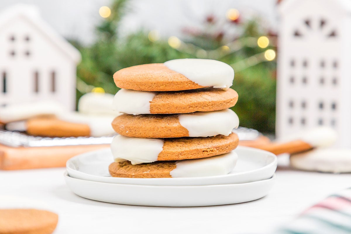 A stack of White Chocolate Dipped Ginger Cookies.