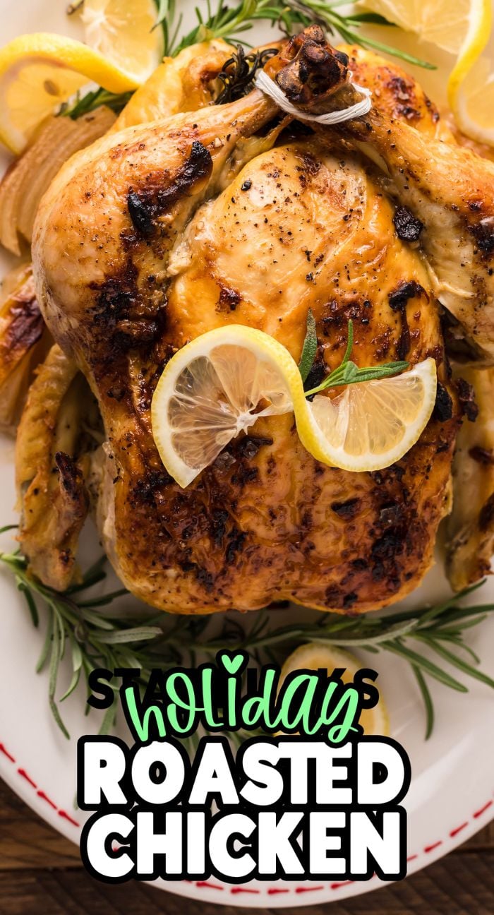 Golden roasted chicken garnished with lemon slices and rosemary, this one pot whole chicken makes the perfect centerpiece for your Holiday Roasted Chicken feast.