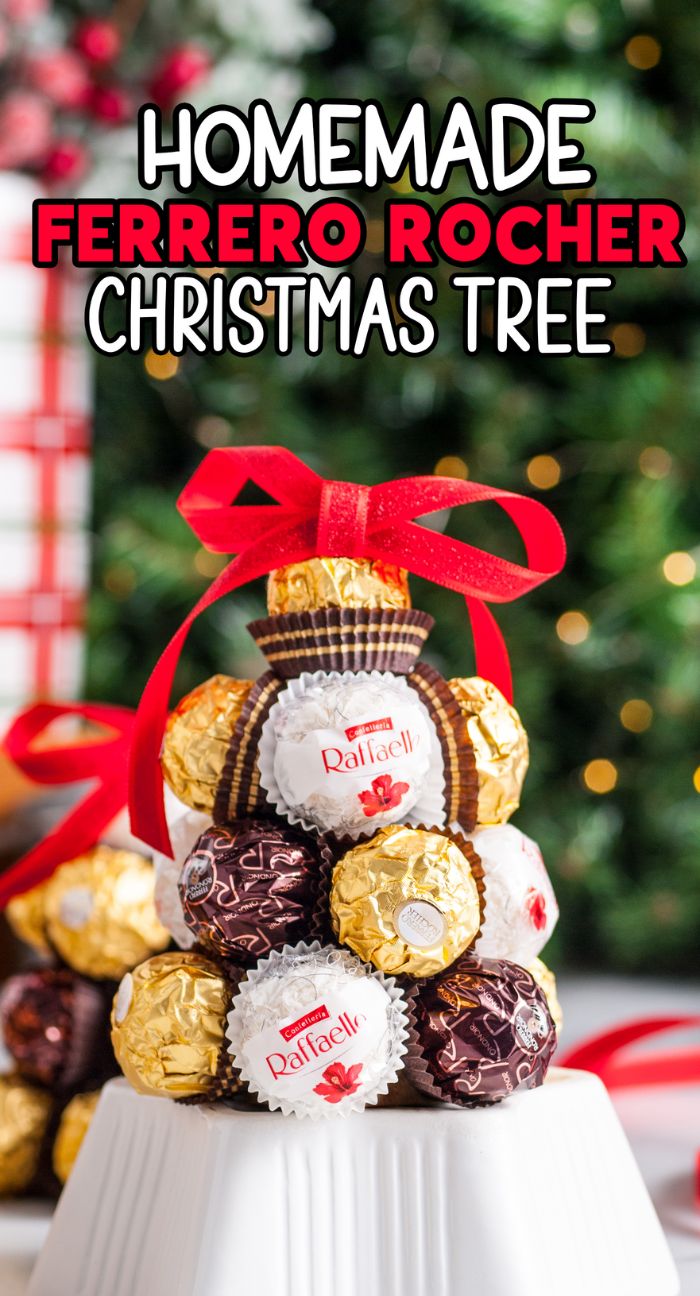 A small Homemade Ferrero Rocher Christmas Tree adorned with Raffaello chocolates and topped with a red bow—a charming DIY Christmas decoration and perfect Christmas hostess gift.
