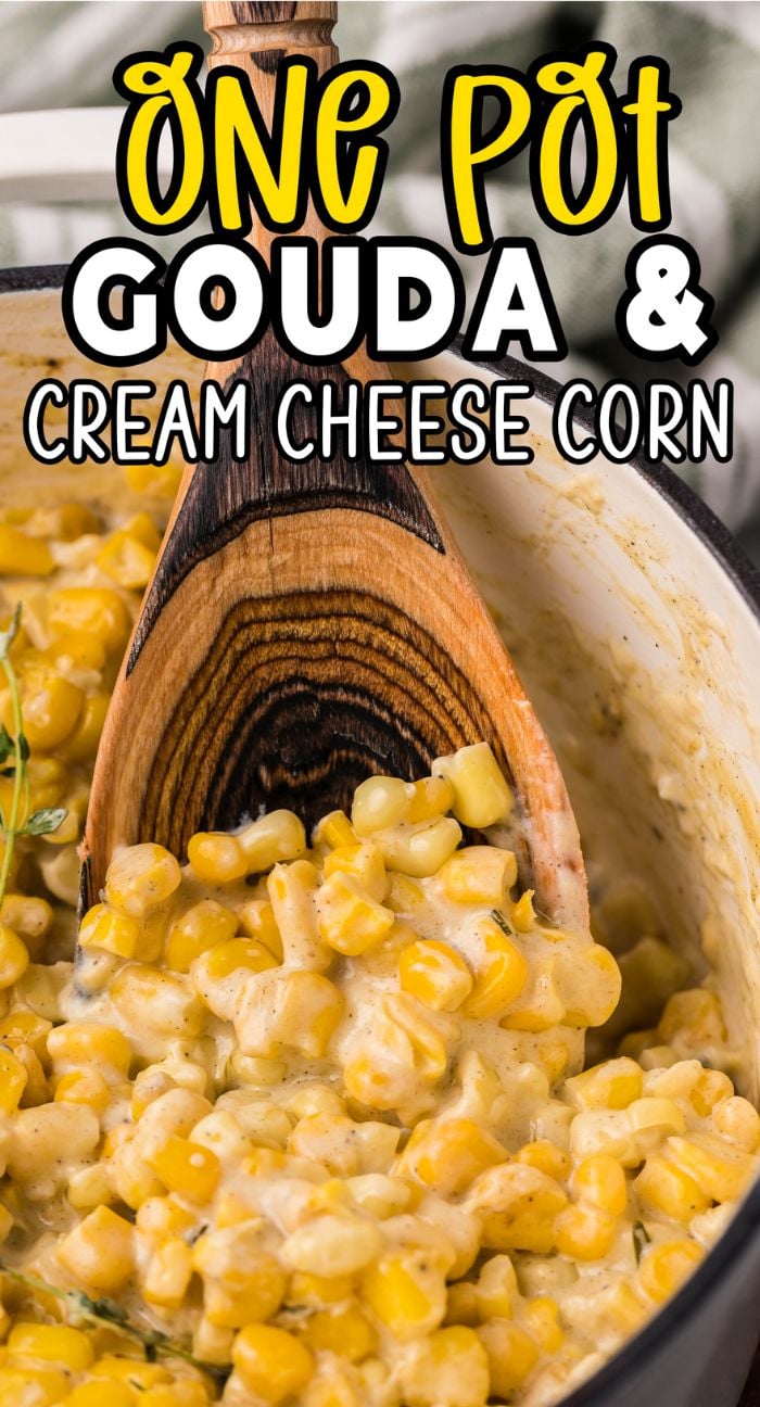 A wooden spoon scoops creamy corn from a pot. Text: "One Pot Gouda and Cream Cheese Corn—your new favorite Thanksgiving or Christmas corn recipe.
