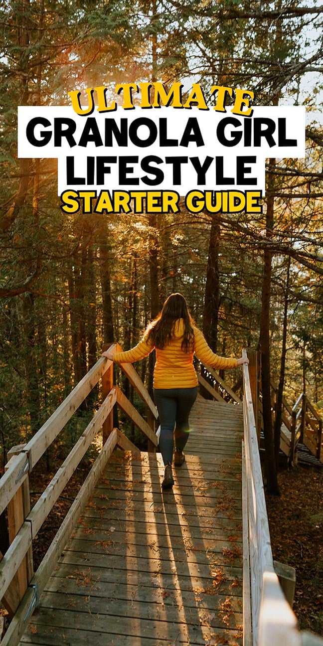 Woman in yellow jacket walks on a wooden path in a sunlit forest, embracing the Granola girl aesthetic. Text: Ultimate Granola Girl Lifestyle Starter Guide.