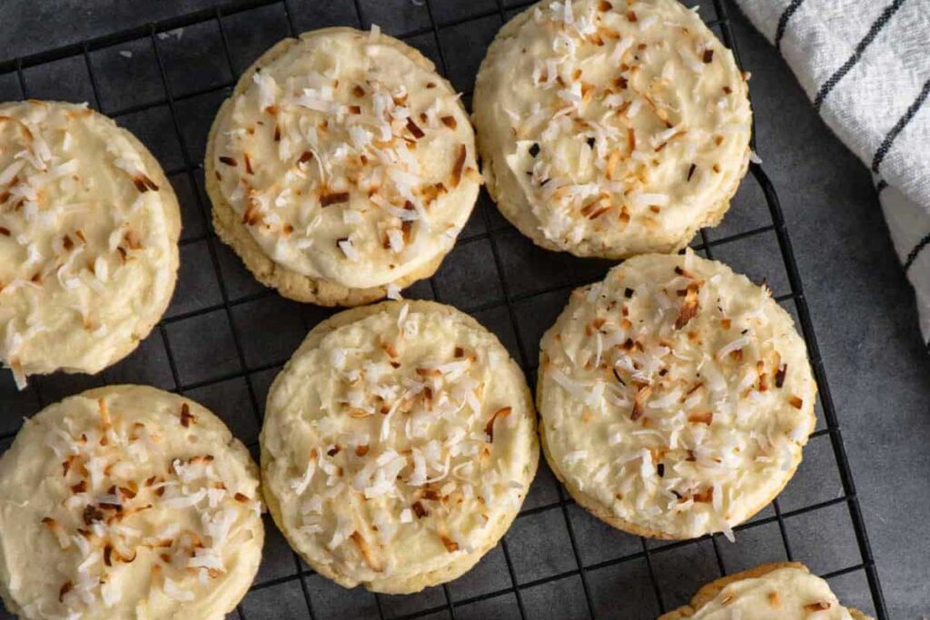 Coconut cookies on a wire rack.