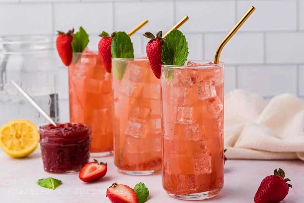 Glasses of seltzer with jam