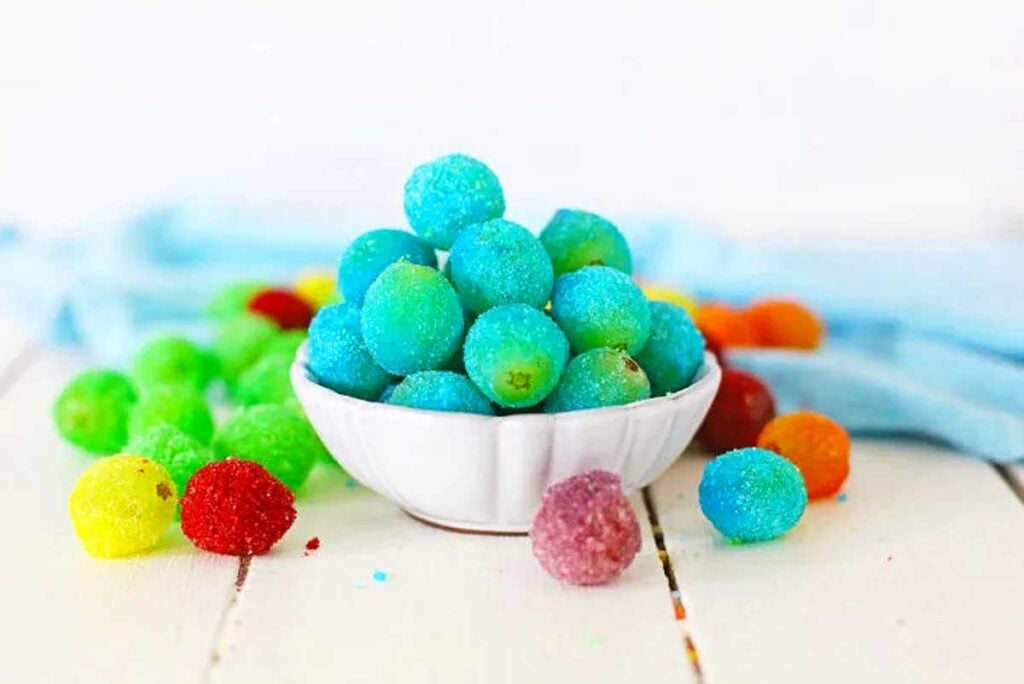 Jello coated grapes in a bowl