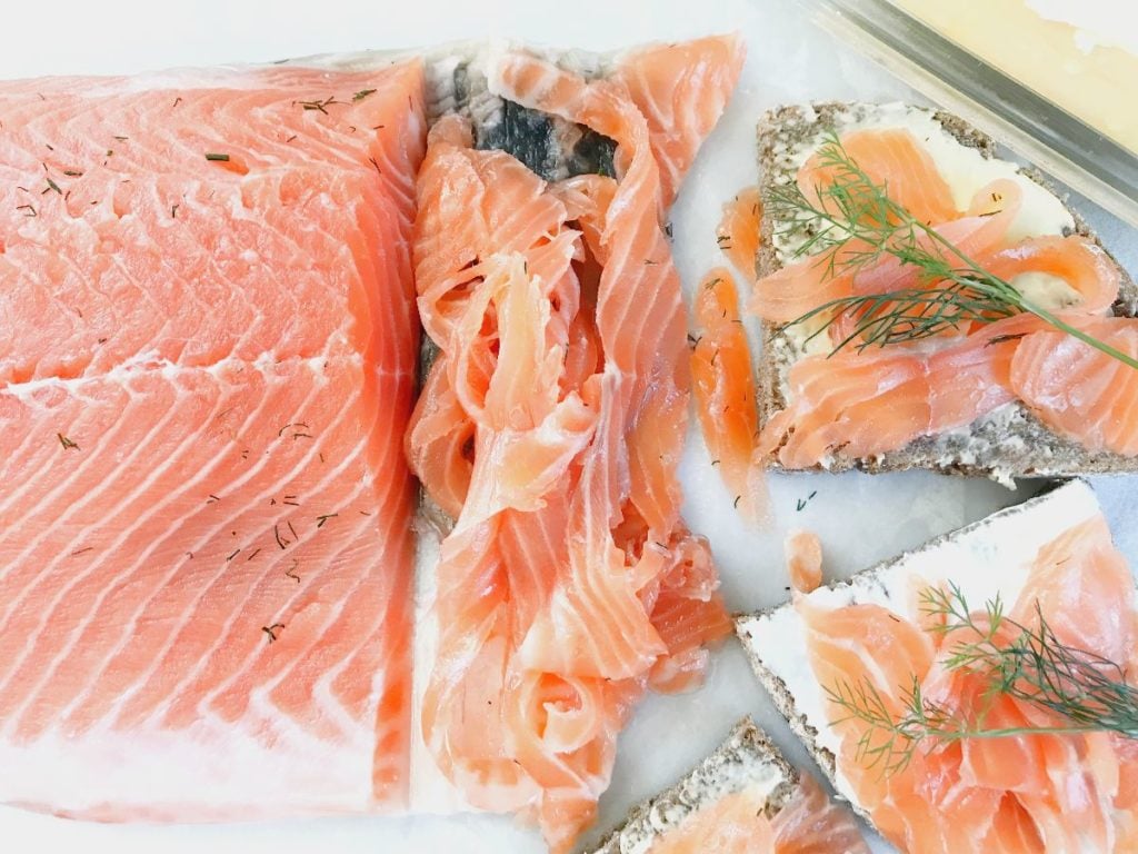 Cured Salmon Lox served on sandwich bread with cream cheese