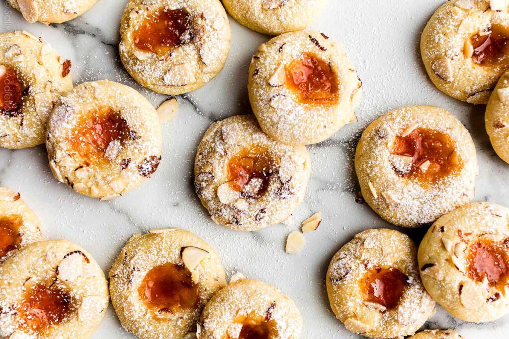 Cream cheese thumb print cookies filled with apircot.