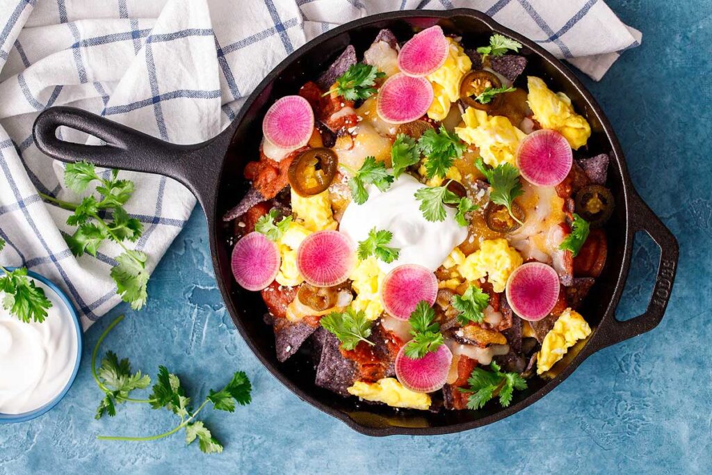 breakfast nachos on a pan.