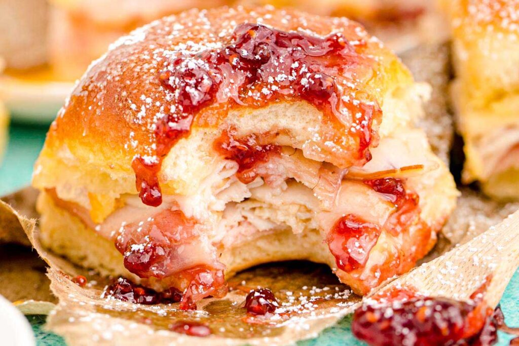 Monte cristo sliders dusted with powered sugar.
