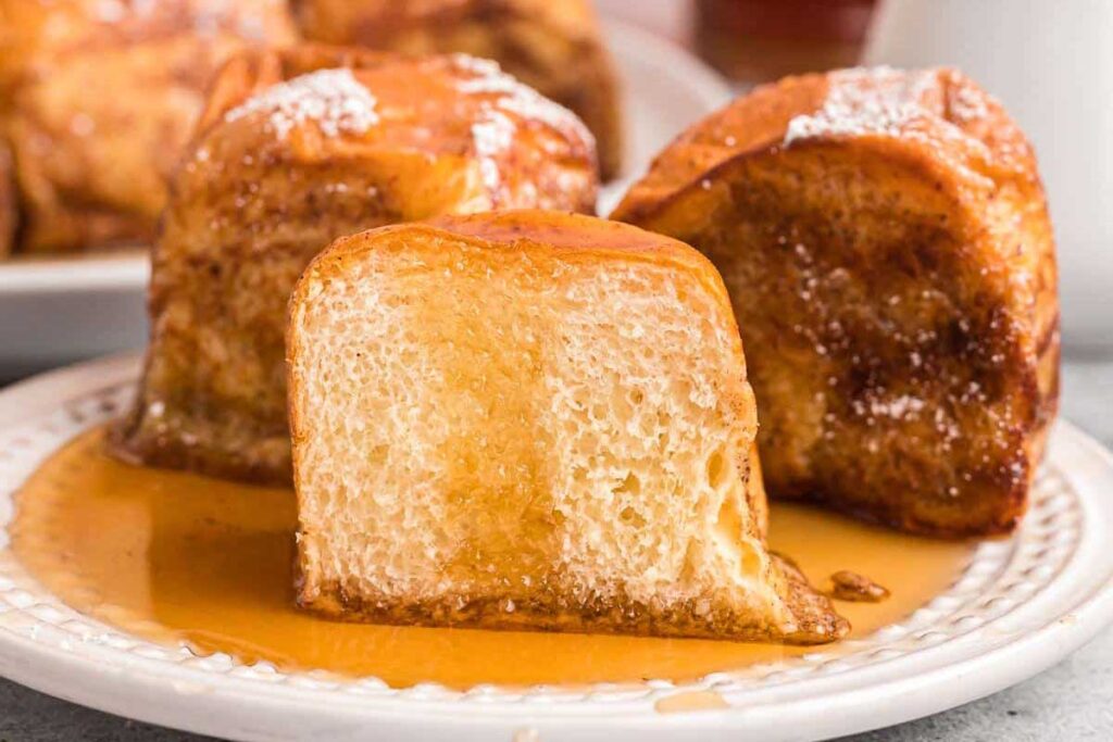 Hawaiian roll french toast on a plate.