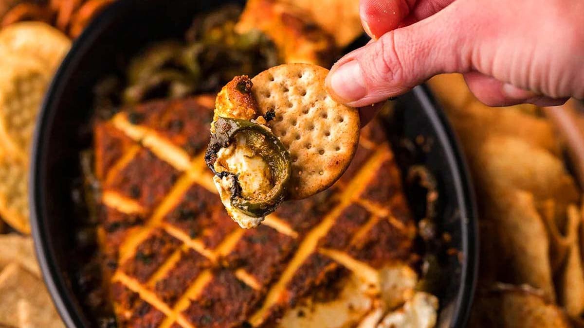 Above view of smoked cream cheese in a cast iron pan.