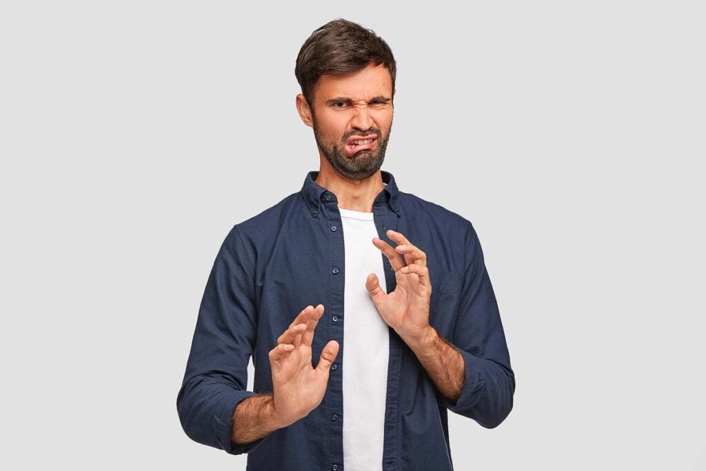 Negative facial expression on a man.
