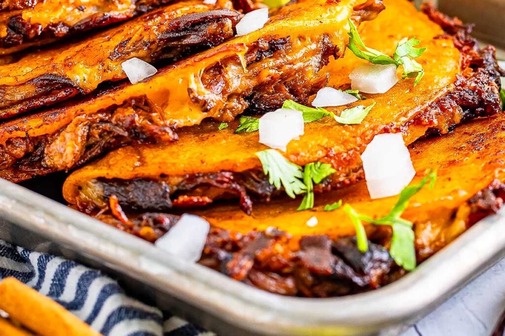 Easy Birria Beef Tacos on a pan.