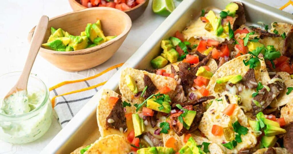 A plate of carne asada nachos
