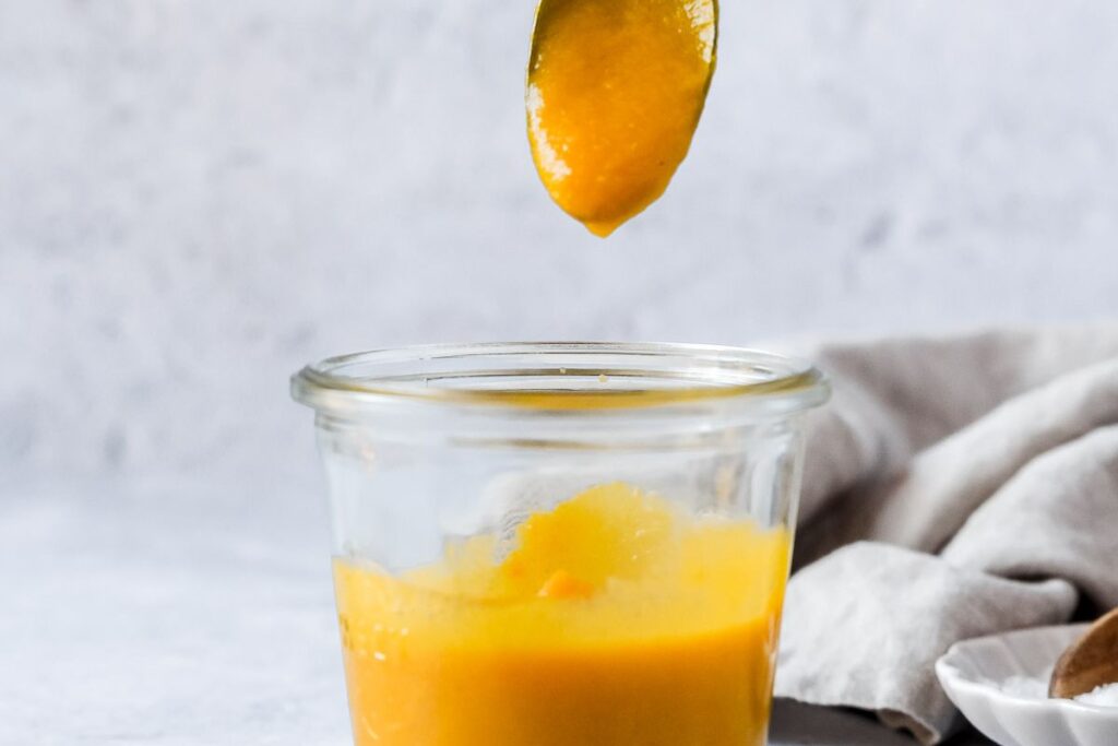 A jar of mango hot sauce.