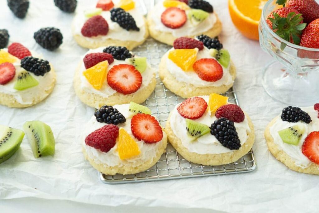 Sugar cookies topped with fresh fruit.