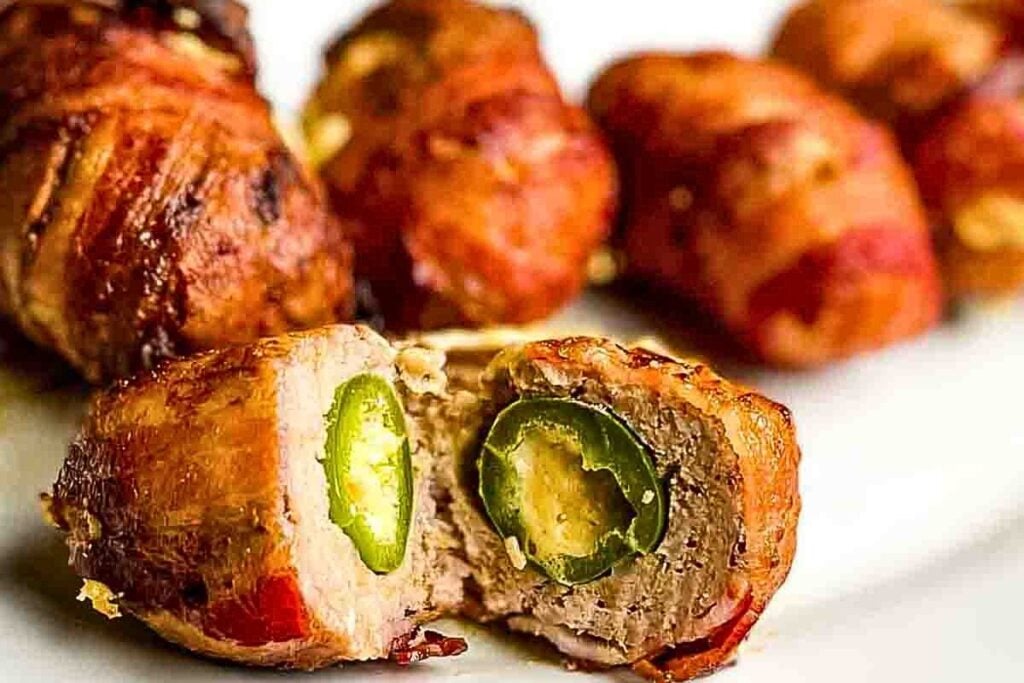 A meatball stuffed with jalapeno poppers and wrapped in bacon.