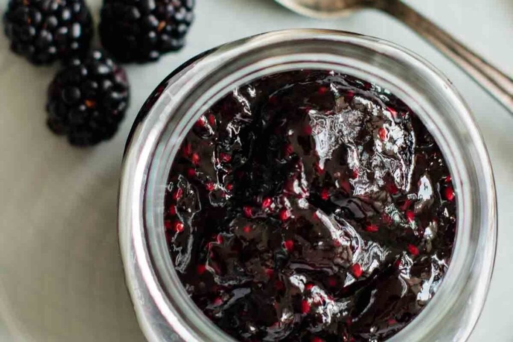 A jar of fresh blackberry jam.