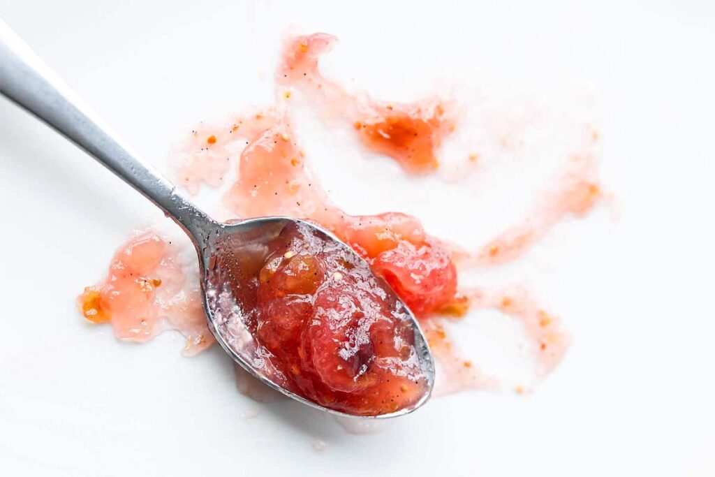 Jam on a spoon.